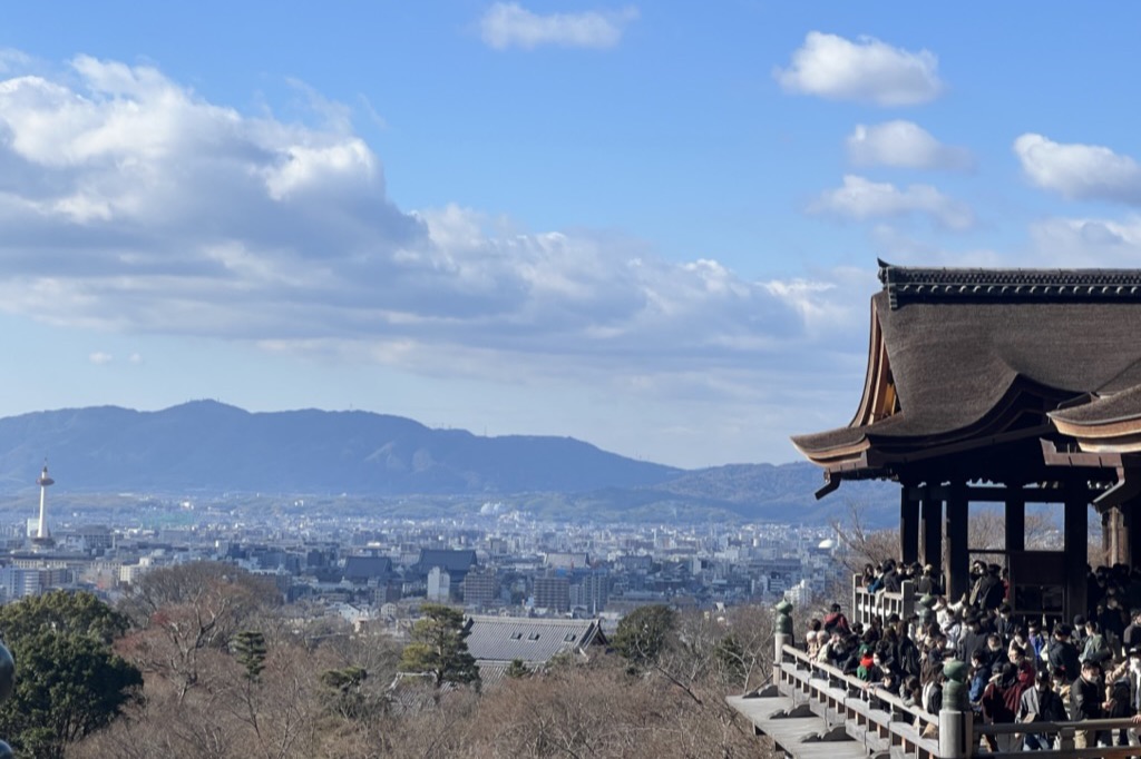 Crowded wooden platform at Kiyomizu-dera temple in Kyoto